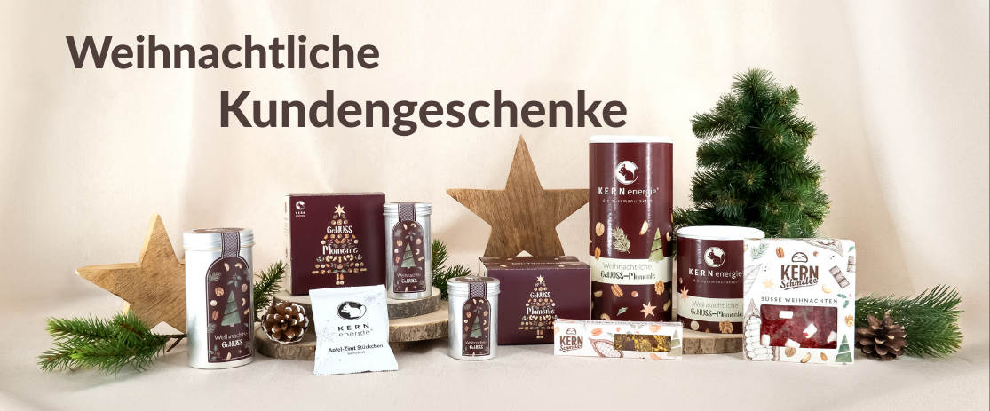 Hochwertige Weihnachtsgeschenke für Kunden mit weihnachtlichen Nussmischungen, gebrannten Mandeln und personalisierbarer Geschenkverpackung