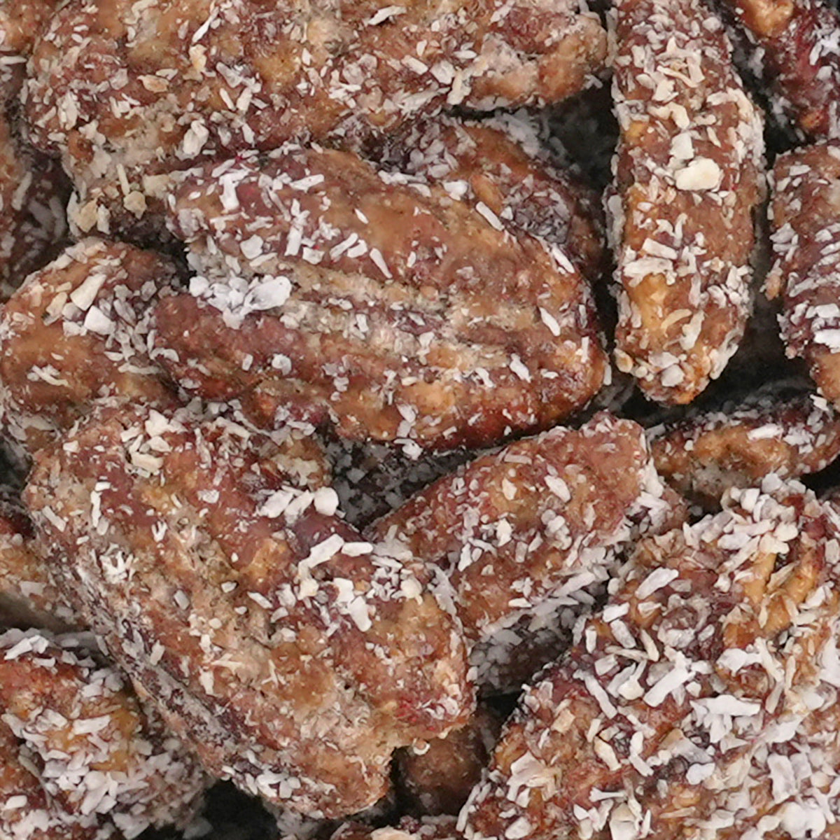 Nahaufnahme "Kokos-Pekannüsse" gebrannte Pekannüsse mit Kokosflocken verfeinert