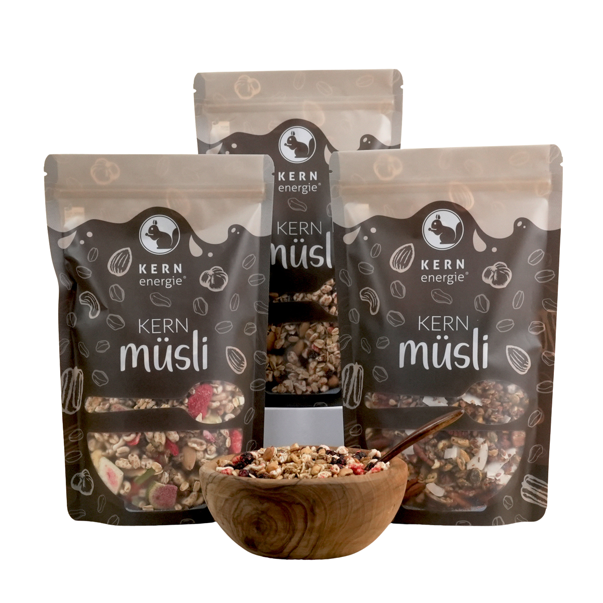 Drei KERNenergie Standbeute mit Sichtfenster auf verschiedene Müslimixe.