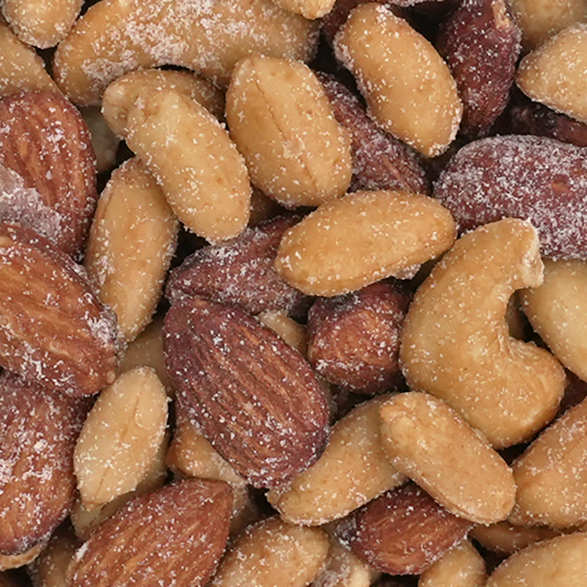 Nahaufnahme Nussmischung "Sweet & Salty" Cashewkerne, Mandeln und Erdnüsse ummantelt von einer Mischung aus Honig und Salz