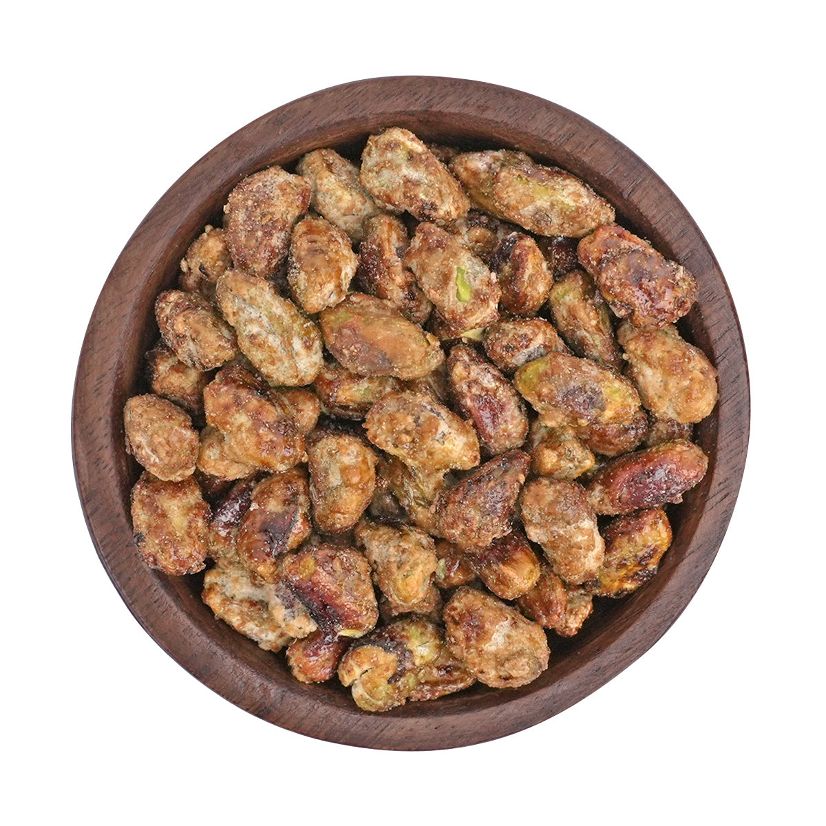 Pistazien gebrannt serviert in Holzschale