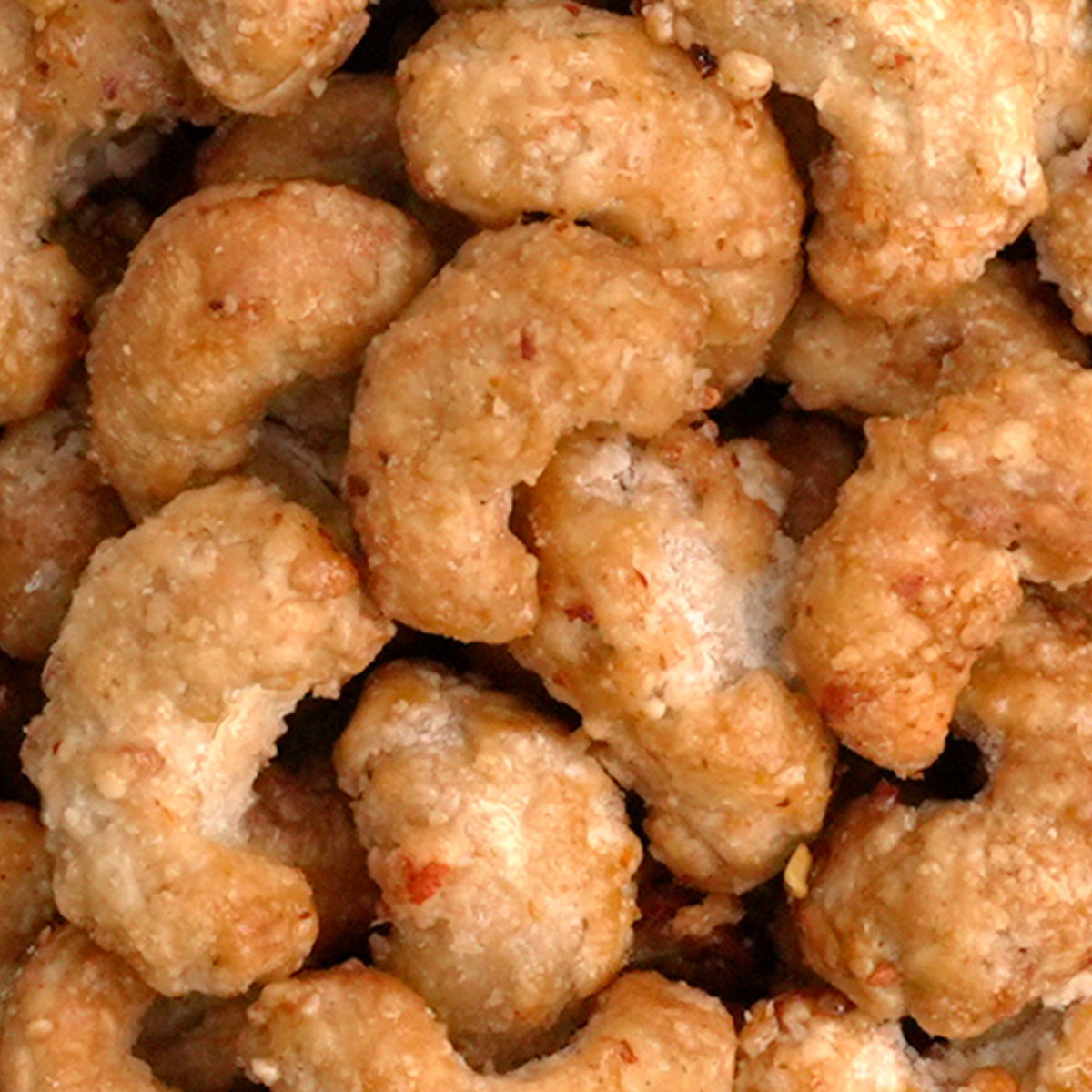 Nahaufnahme "Hot Honey Cashews" Gebrannte Cashews mit süßem Honig sowie einer Prise Chili-Schärfe