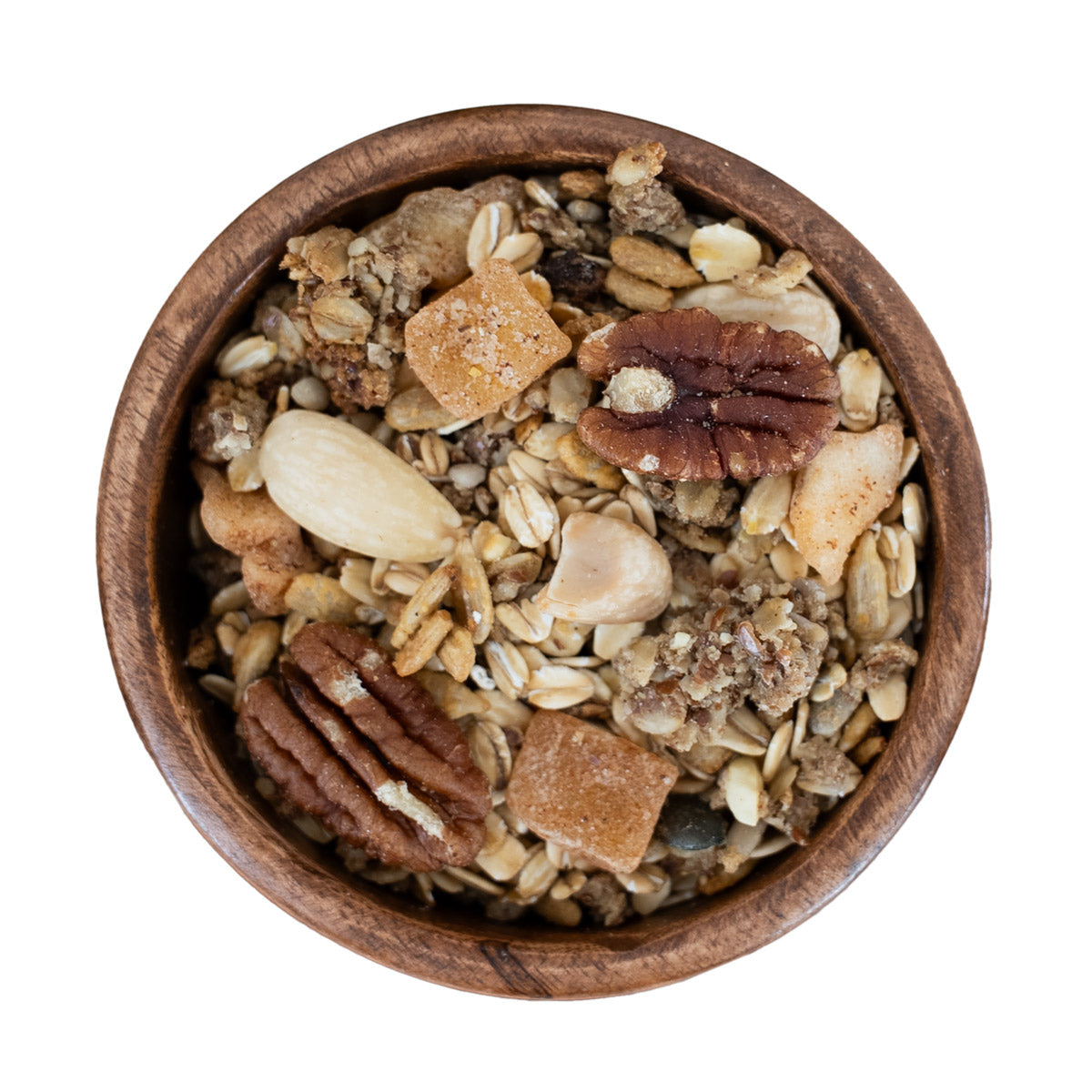 Winterliches KERNmüsli aus gerösteten Nüssen, Granola und Apfel-Zimt-Stücken in Holzschale